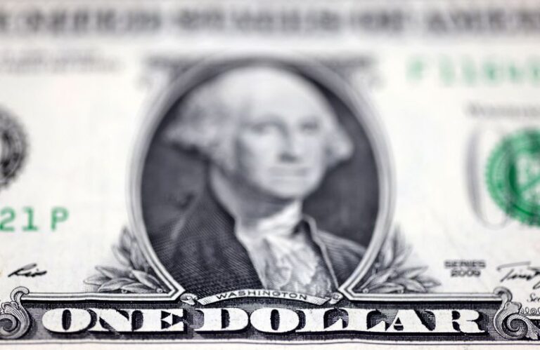 US dollar stabilizes after sharp decline, though still set for significant weekly loss.