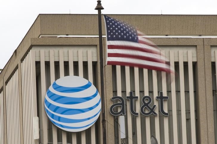 AT&T surpasses Q1 earnings predictions, shares rise despite revenue miss.